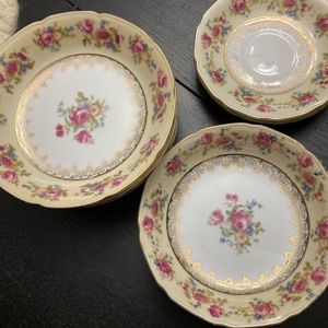 Matching set antique side plates/bowls